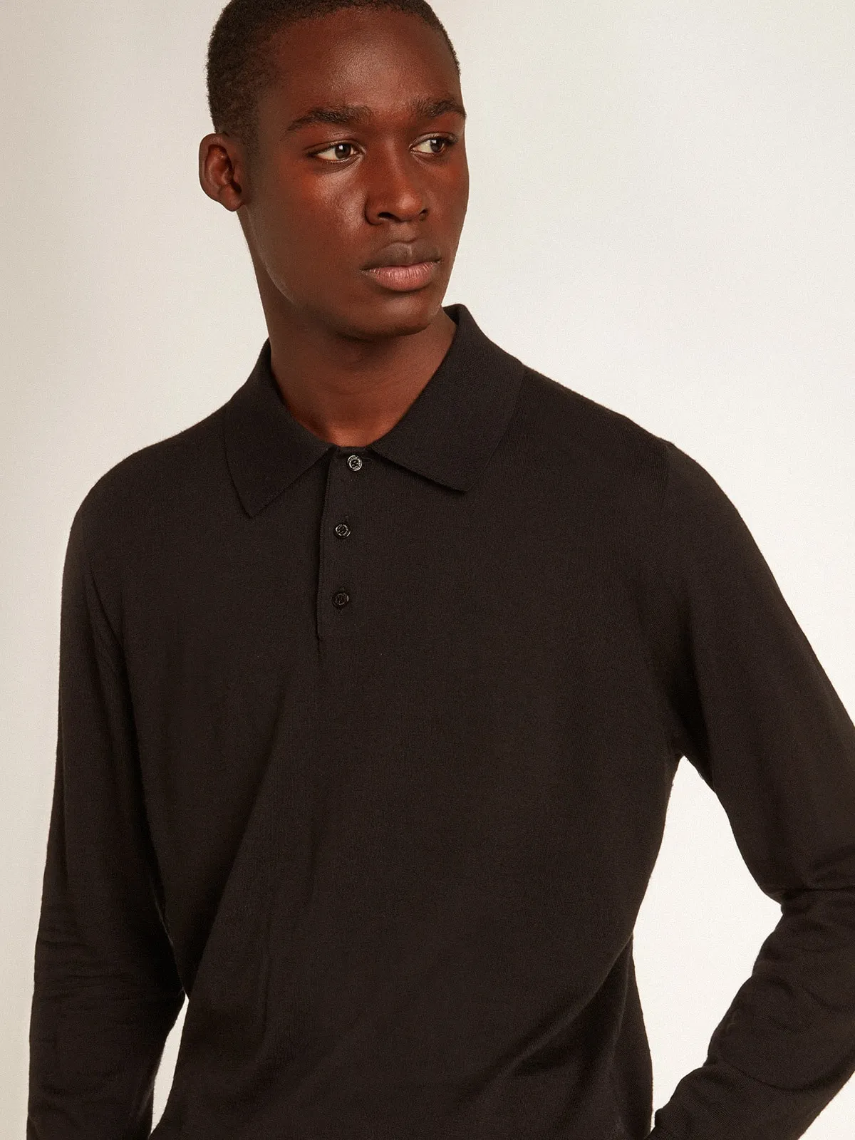 Men’s long-sleeved polo shirt in black merino wool