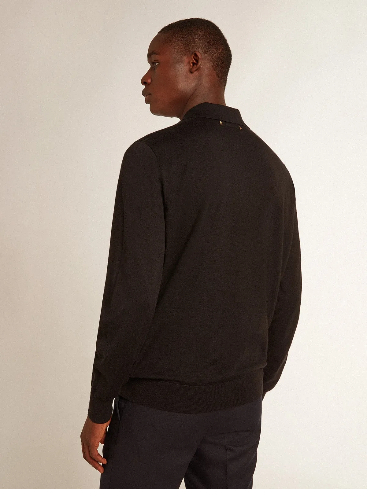 Men’s long-sleeved polo shirt in black merino wool