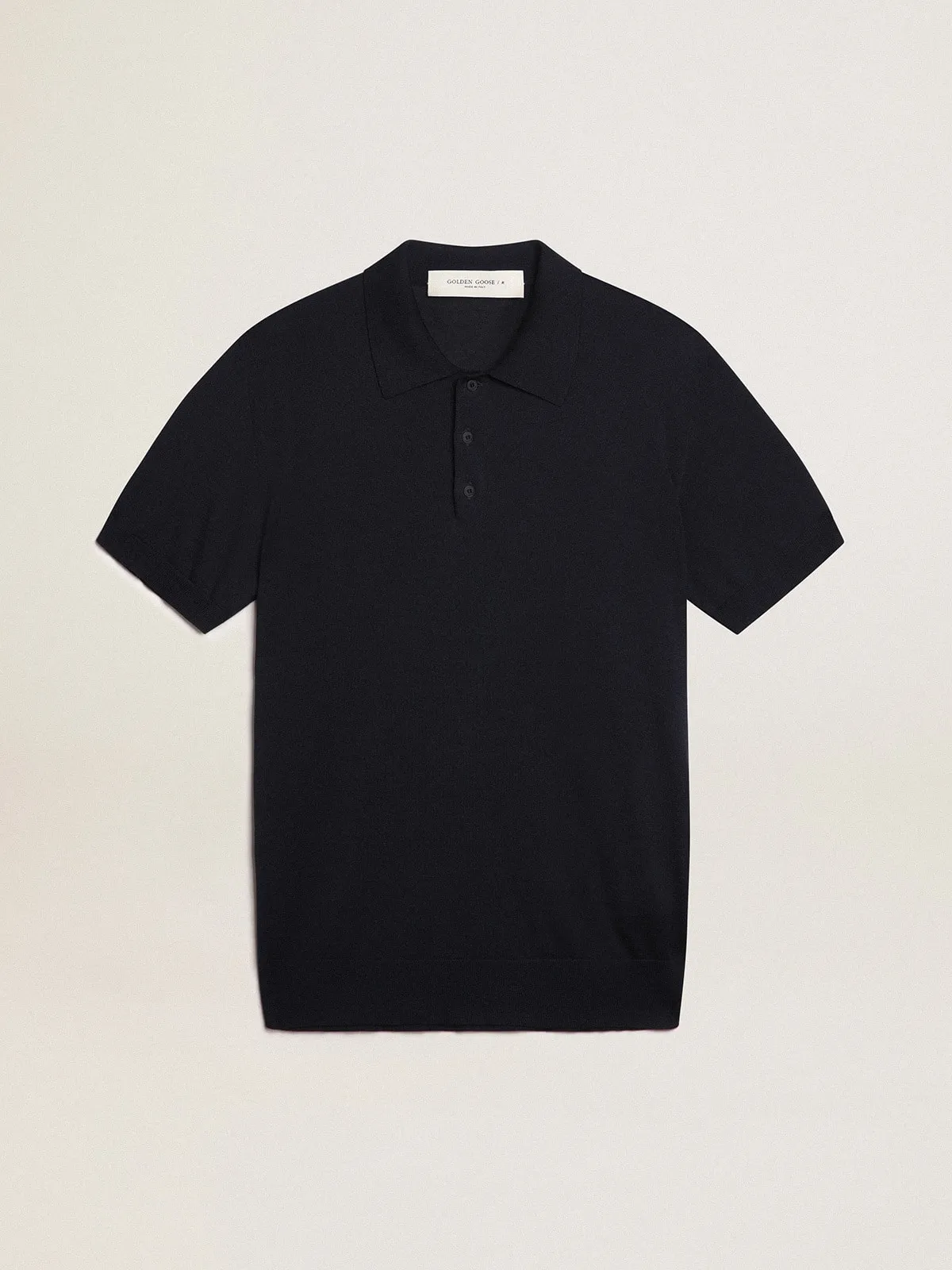 Men’s short-sleeved polo shirt in navy-blue merino wool