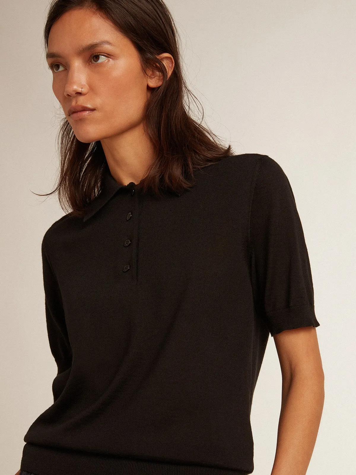 Women’s polo shirt in black merino wool